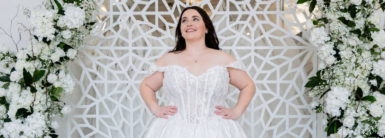 Photo of the wearing a white bridal gown 