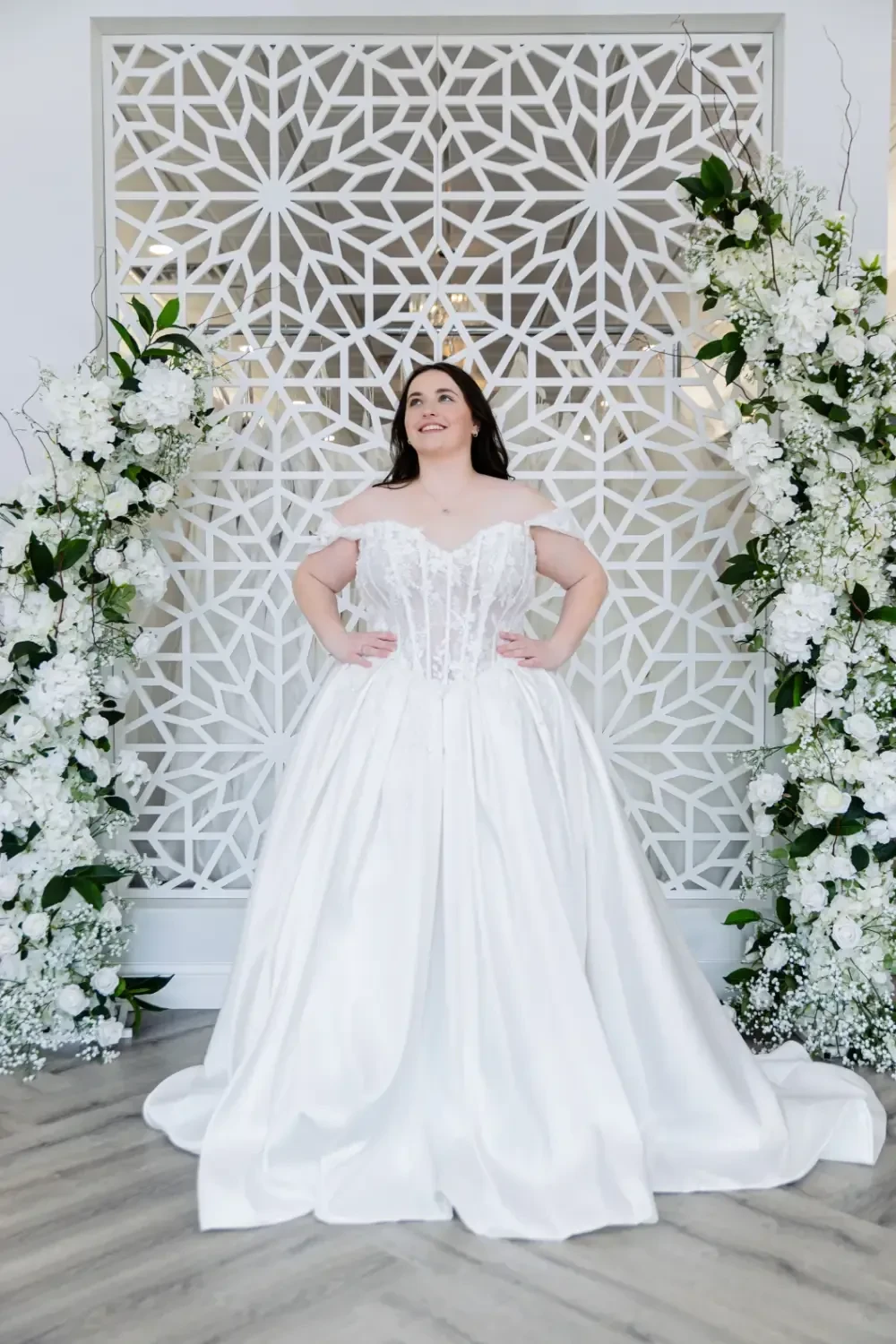 Photo of the model wearing a white bridal gown - Mobile Image